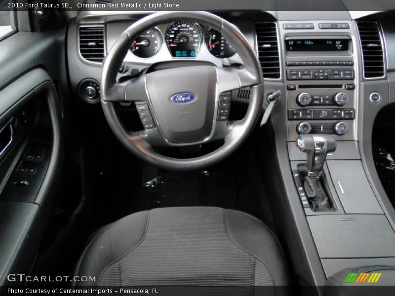 Cinnamon Red Metallic / Light Stone 2010 Ford Taurus SEL
