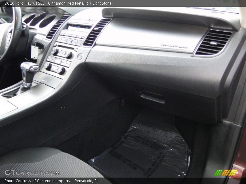 Cinnamon Red Metallic / Light Stone 2010 Ford Taurus SEL