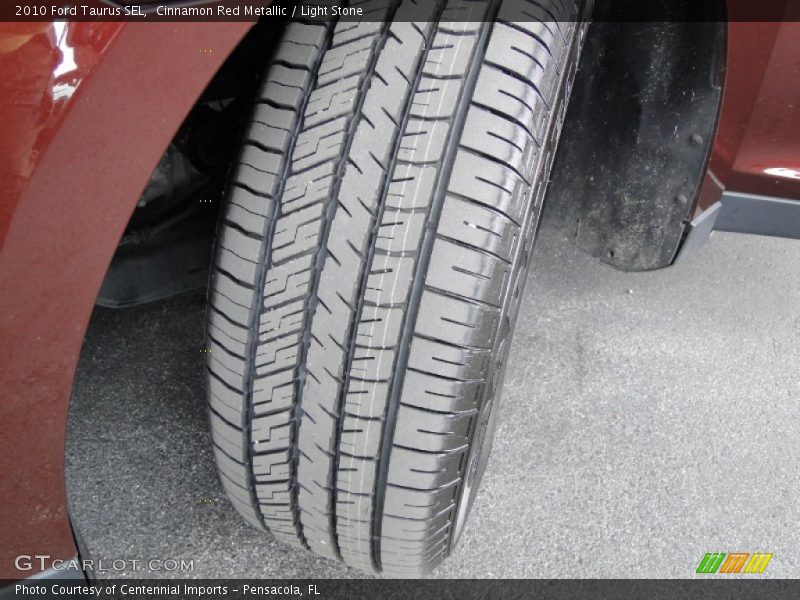 Cinnamon Red Metallic / Light Stone 2010 Ford Taurus SEL