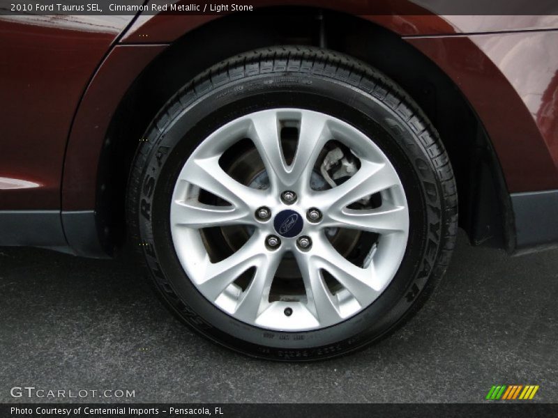 Cinnamon Red Metallic / Light Stone 2010 Ford Taurus SEL