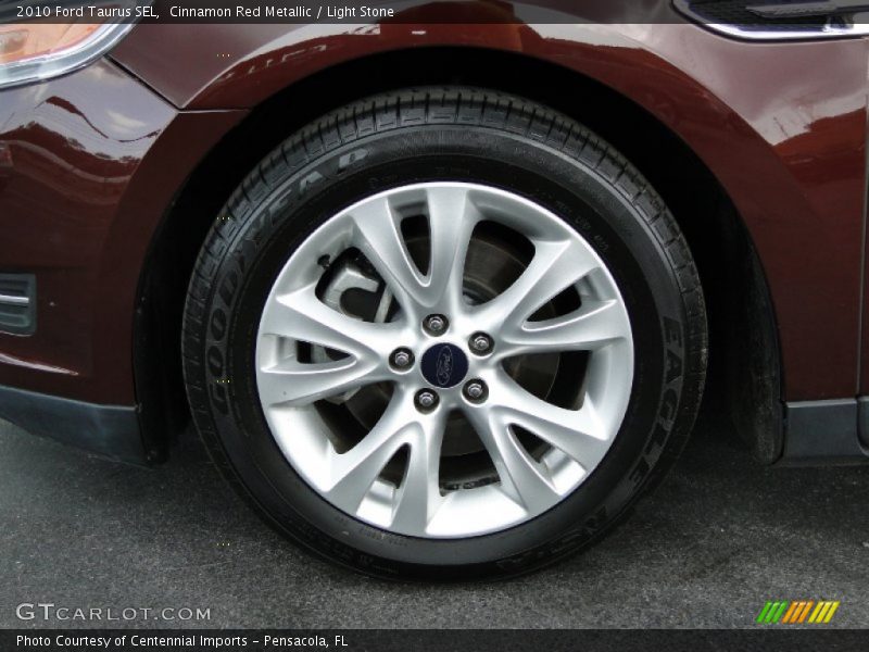 Cinnamon Red Metallic / Light Stone 2010 Ford Taurus SEL