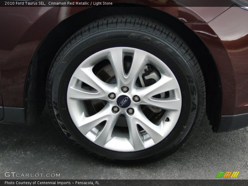 Cinnamon Red Metallic / Light Stone 2010 Ford Taurus SEL