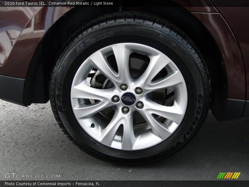 Cinnamon Red Metallic / Light Stone 2010 Ford Taurus SEL