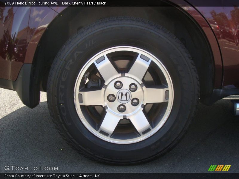 Dark Cherry Pearl / Black 2009 Honda Pilot Touring 4WD