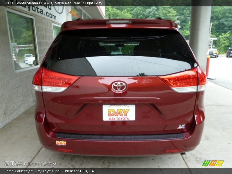 Salsa Red Pearl / Light Gray 2011 Toyota Sienna LE AWD