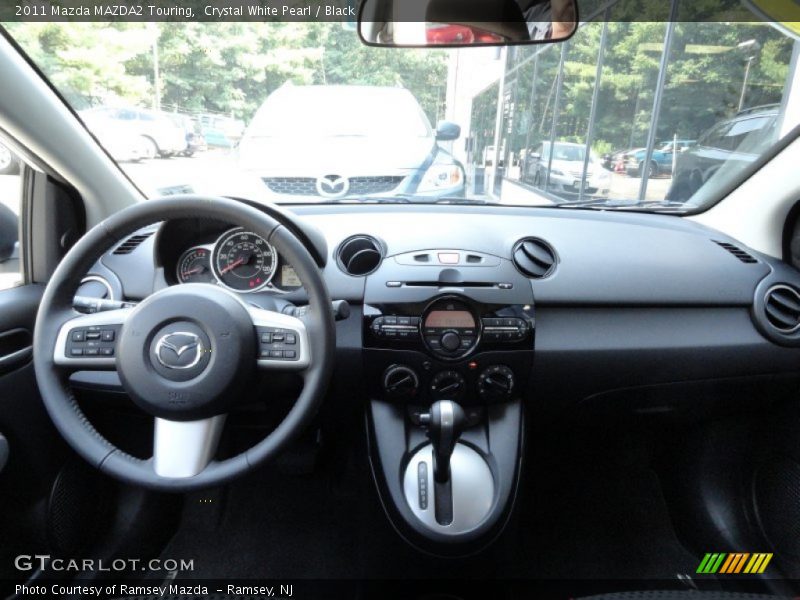 Dashboard of 2011 MAZDA2 Touring