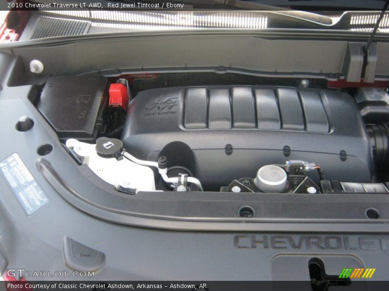 Red Jewel Tintcoat / Ebony 2010 Chevrolet Traverse LT AWD