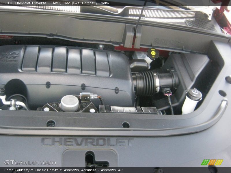 Red Jewel Tintcoat / Ebony 2010 Chevrolet Traverse LT AWD