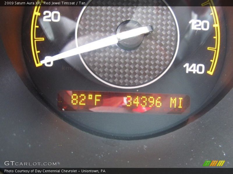 Red Jewel Tintcoat / Tan 2009 Saturn Aura XR