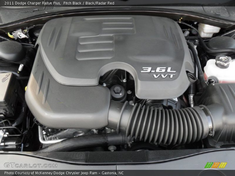 Pitch Black / Black/Radar Red 2011 Dodge Charger Rallye Plus
