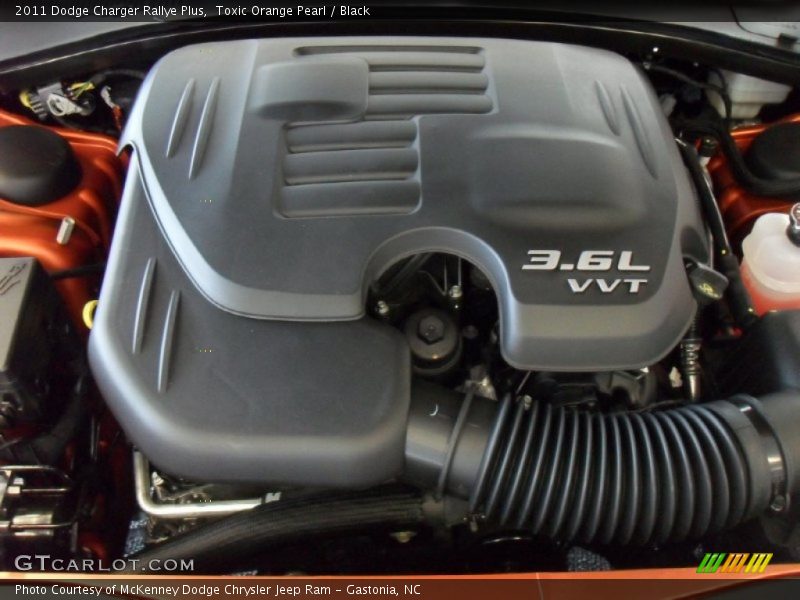 Toxic Orange Pearl / Black 2011 Dodge Charger Rallye Plus