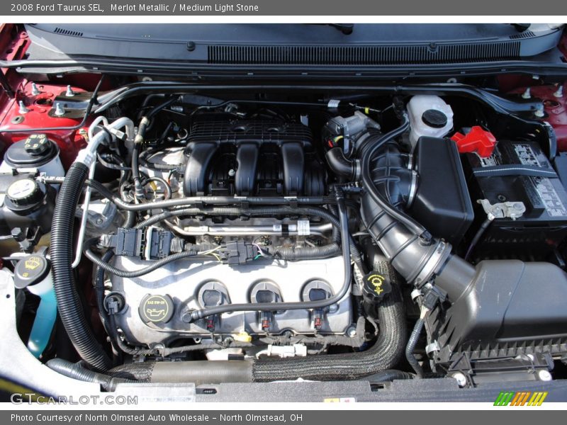 Merlot Metallic / Medium Light Stone 2008 Ford Taurus SEL