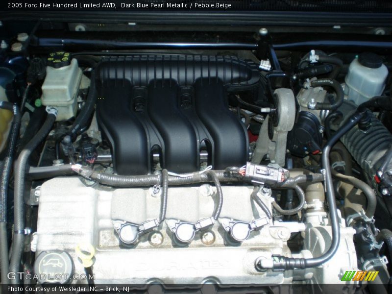 Dark Blue Pearl Metallic / Pebble Beige 2005 Ford Five Hundred Limited AWD