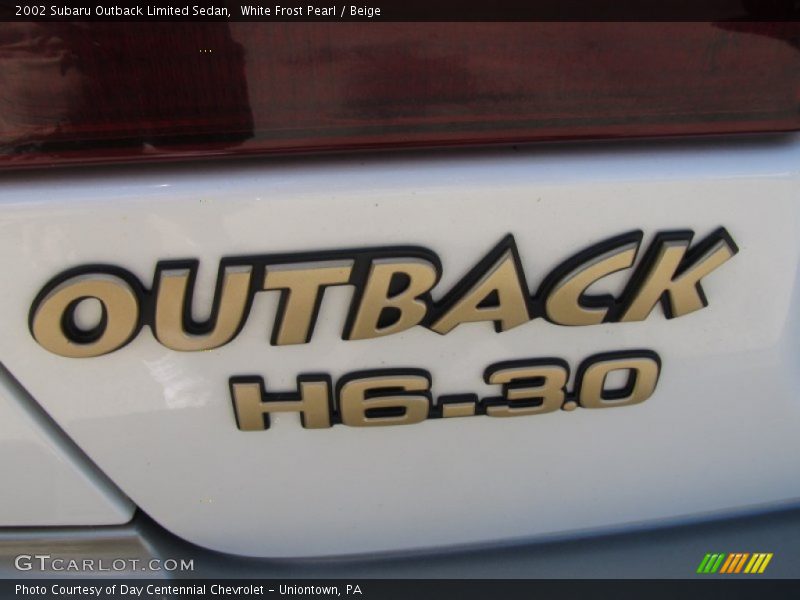 White Frost Pearl / Beige 2002 Subaru Outback Limited Sedan