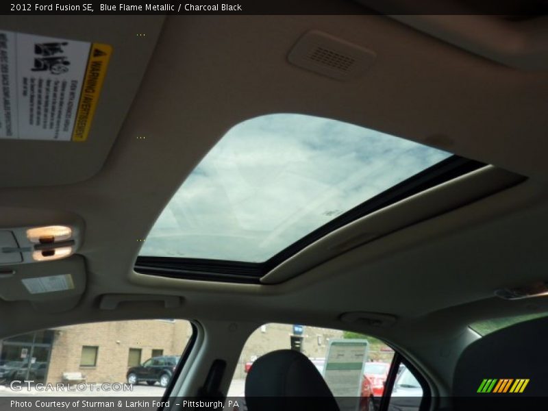 Blue Flame Metallic / Charcoal Black 2012 Ford Fusion SE