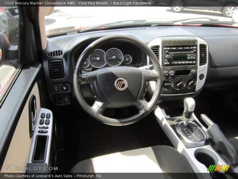 Vivid Red Metallic / Black/Light Parchment 2006 Mercury Mariner Convenience 4WD