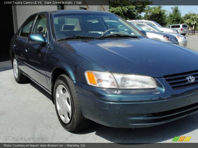 Dark Green Metallic / Oak 1998 Toyota Camry LE V6