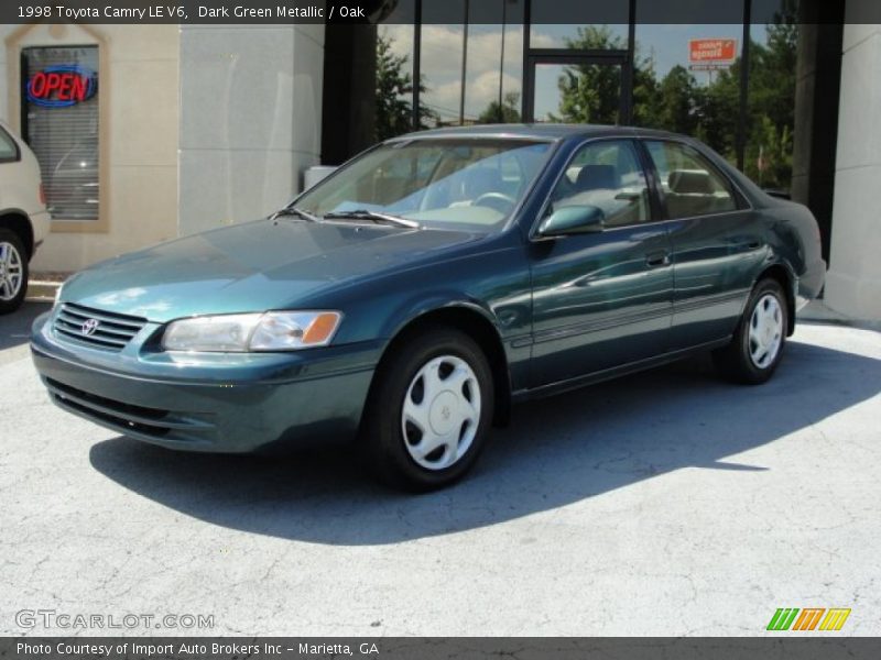 Dark Green Metallic / Oak 1998 Toyota Camry LE V6