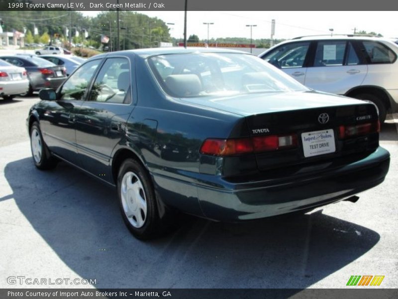 Dark Green Metallic / Oak 1998 Toyota Camry LE V6