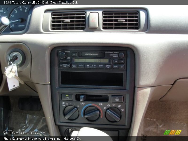 Dark Green Metallic / Oak 1998 Toyota Camry LE V6
