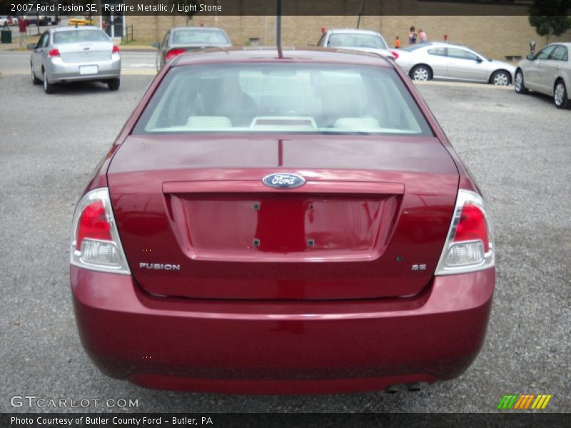 Redfire Metallic / Light Stone 2007 Ford Fusion SE