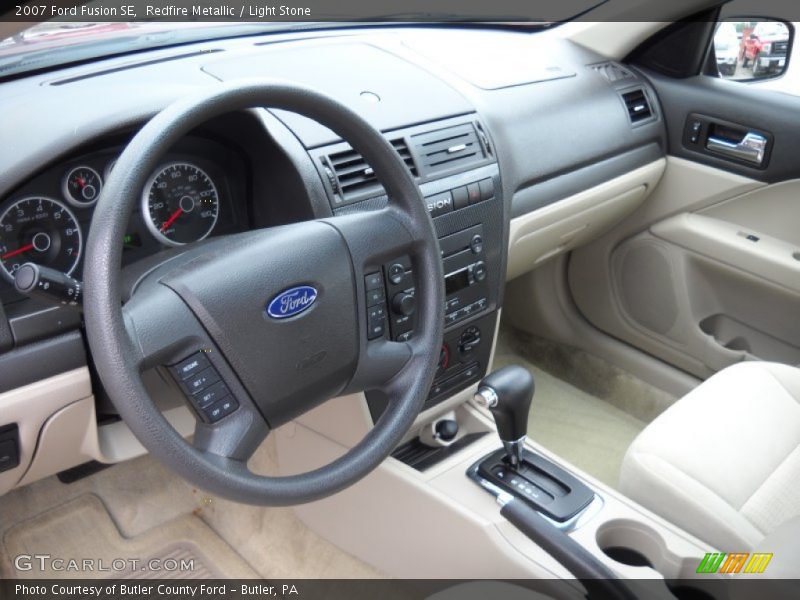 Redfire Metallic / Light Stone 2007 Ford Fusion SE