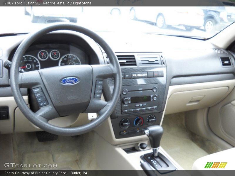 Redfire Metallic / Light Stone 2007 Ford Fusion SE