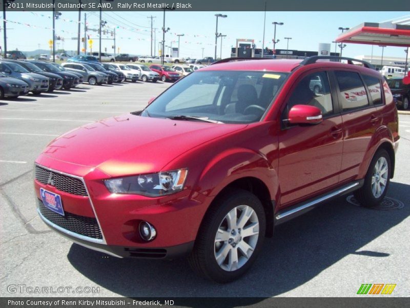 Rally Red Metallic / Black 2011 Mitsubishi Outlander SE AWD