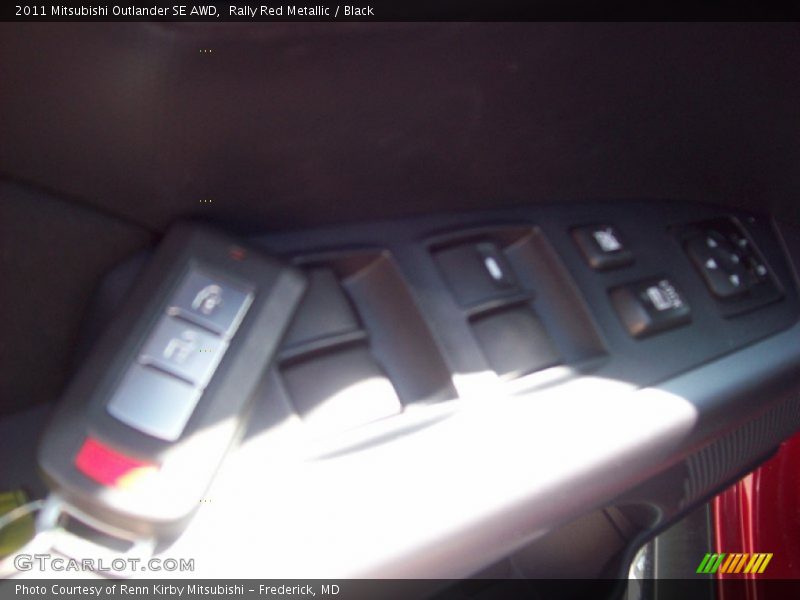 Rally Red Metallic / Black 2011 Mitsubishi Outlander SE AWD