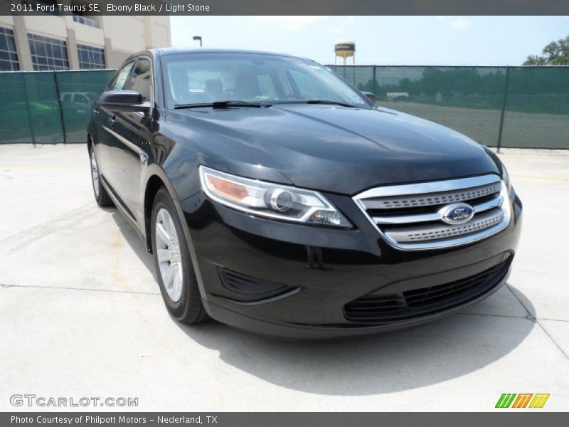 Ebony Black / Light Stone 2011 Ford Taurus SE