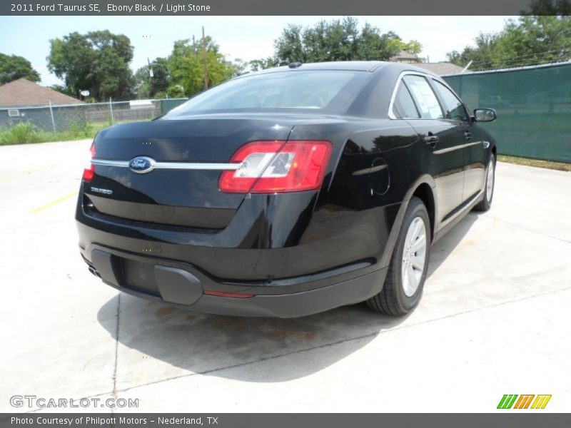 Ebony Black / Light Stone 2011 Ford Taurus SE
