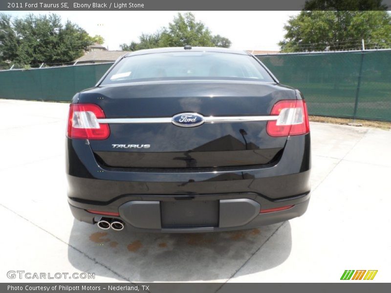 Ebony Black / Light Stone 2011 Ford Taurus SE
