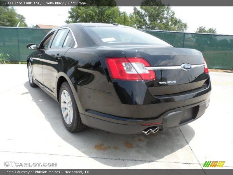 Ebony Black / Light Stone 2011 Ford Taurus SE