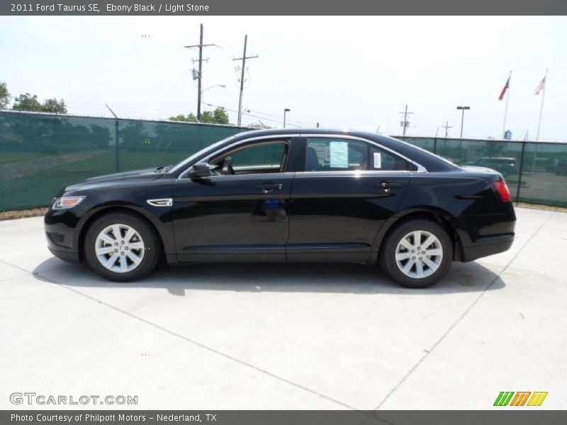 Ebony Black / Light Stone 2011 Ford Taurus SE