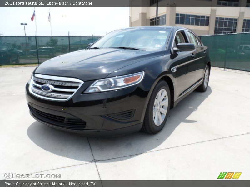 Ebony Black / Light Stone 2011 Ford Taurus SE