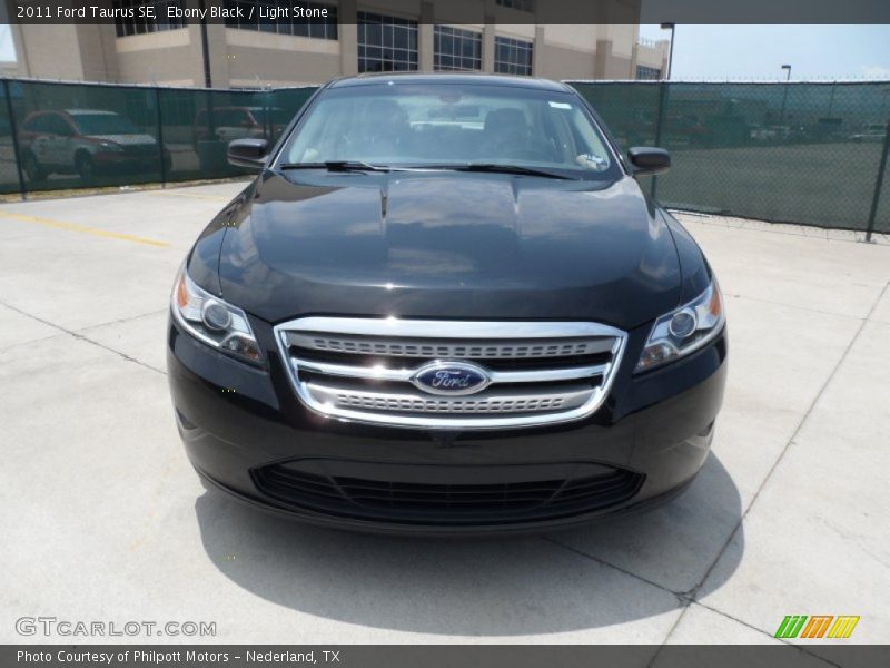 Ebony Black / Light Stone 2011 Ford Taurus SE