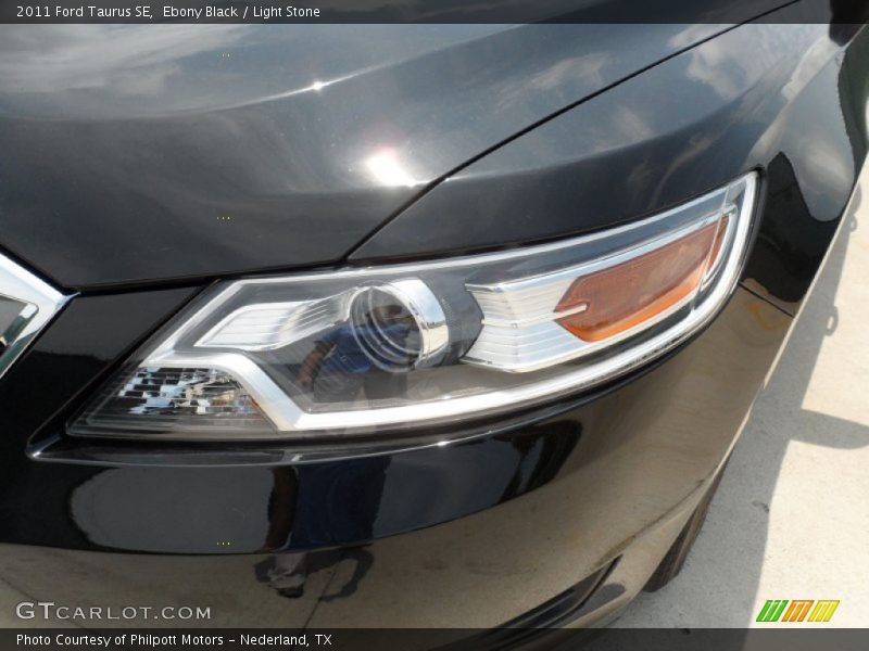 Ebony Black / Light Stone 2011 Ford Taurus SE