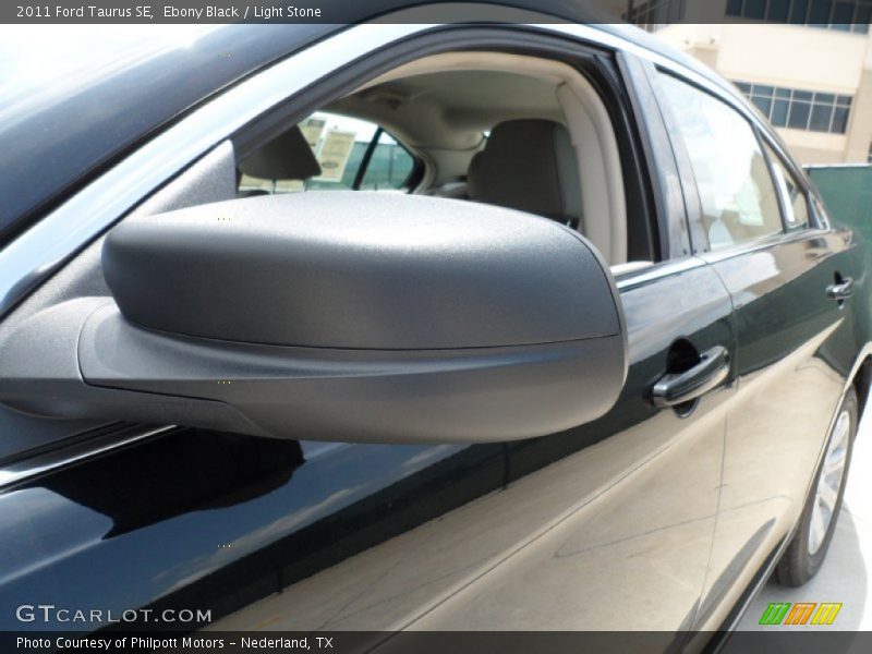 Ebony Black / Light Stone 2011 Ford Taurus SE