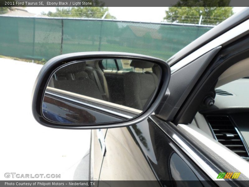 Ebony Black / Light Stone 2011 Ford Taurus SE