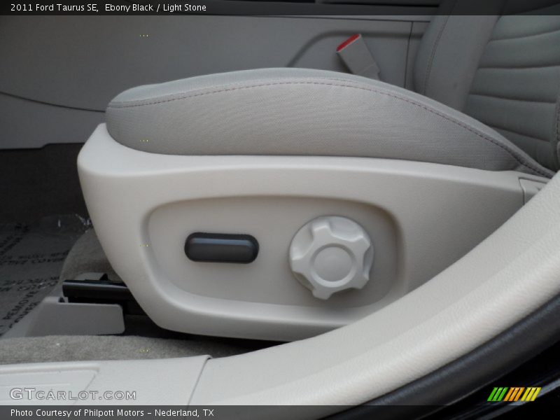 Ebony Black / Light Stone 2011 Ford Taurus SE