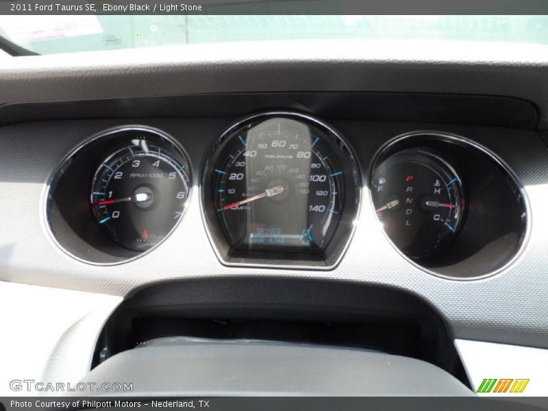 Ebony Black / Light Stone 2011 Ford Taurus SE