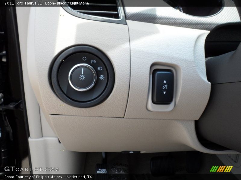 Ebony Black / Light Stone 2011 Ford Taurus SE