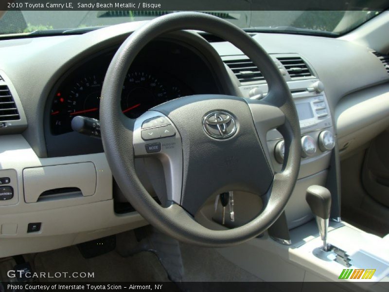 Sandy Beach Metallic / Bisque 2010 Toyota Camry LE