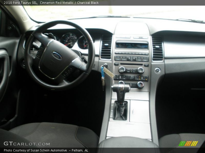 Cinnamon Red Metallic / Charcoal Black 2010 Ford Taurus SEL