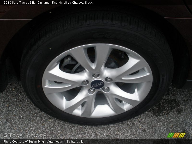 Cinnamon Red Metallic / Charcoal Black 2010 Ford Taurus SEL