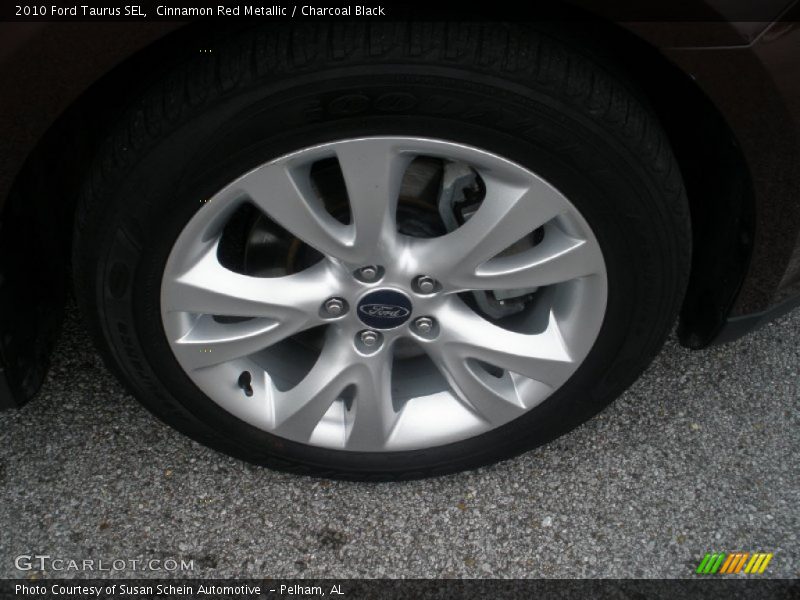 Cinnamon Red Metallic / Charcoal Black 2010 Ford Taurus SEL