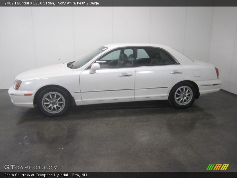 Ivory White Pearl / Beige 2002 Hyundai XG350 Sedan