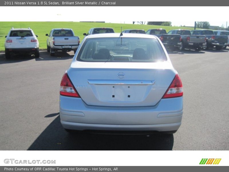 Brilliant Silver Metallic / Charcoal 2011 Nissan Versa 1.8 SL Sedan