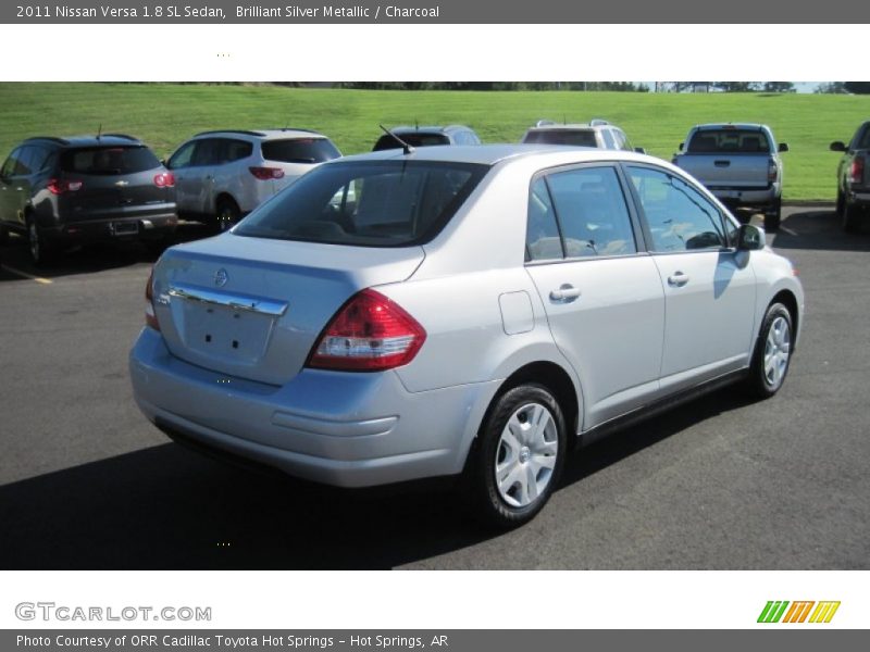 Brilliant Silver Metallic / Charcoal 2011 Nissan Versa 1.8 SL Sedan