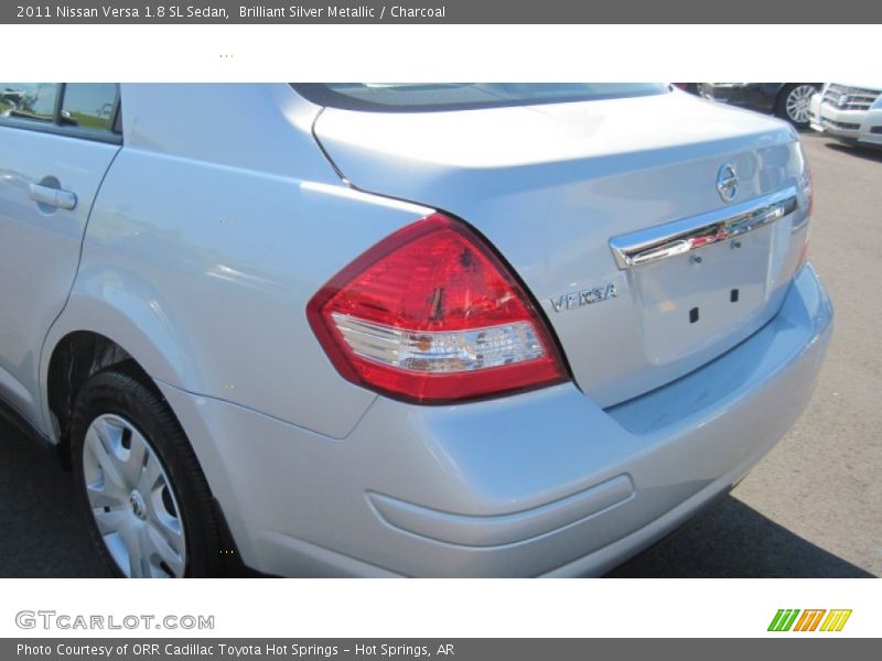 Brilliant Silver Metallic / Charcoal 2011 Nissan Versa 1.8 SL Sedan